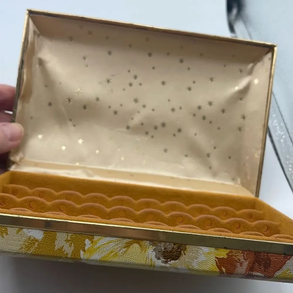 Vintage 70’s pierced earrings case. Golden rod floral print.